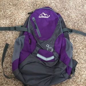 Sunhiker purple smal hiking backpack